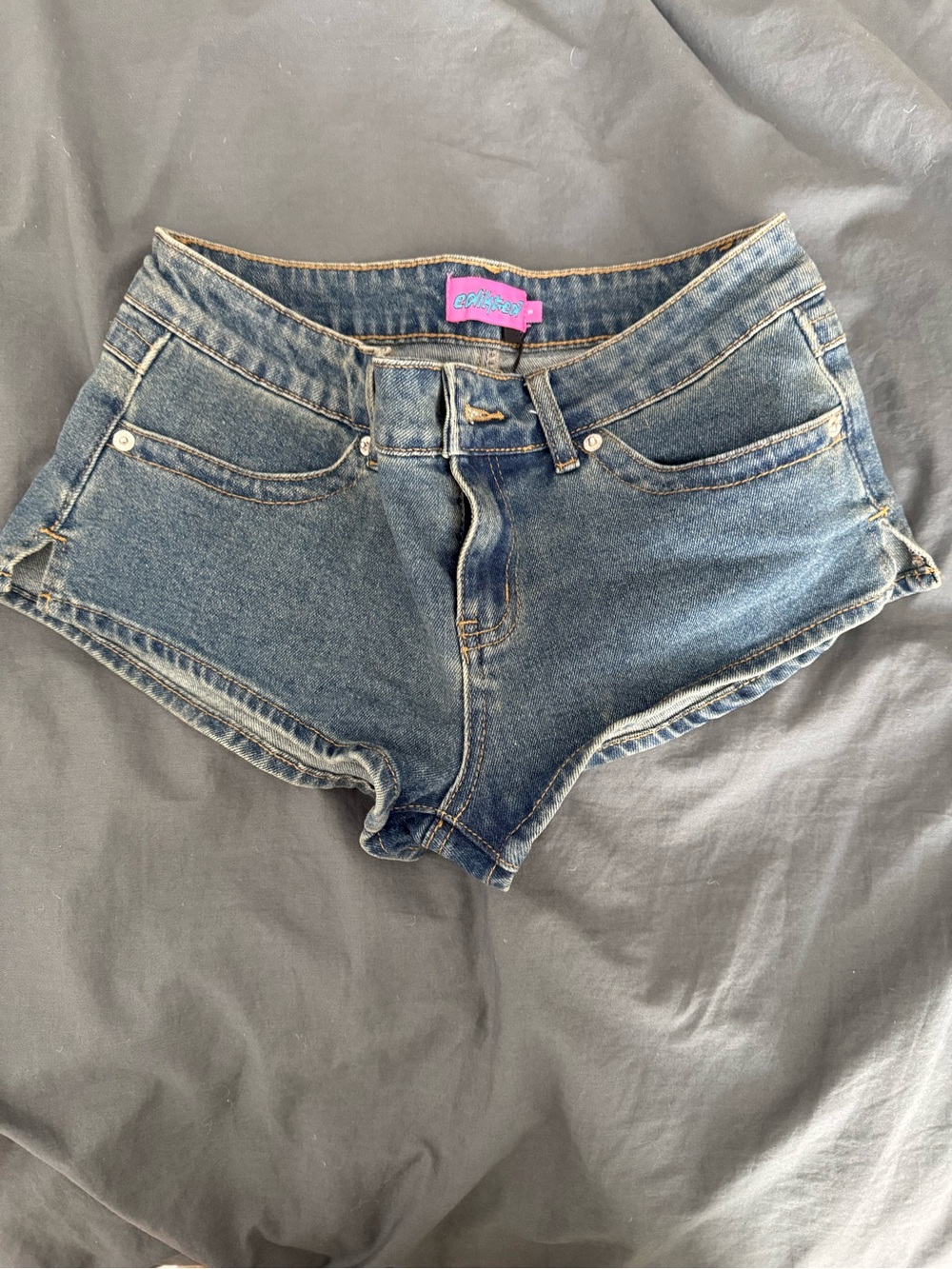 Edited edgy low-rise blue denim shorts